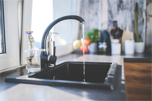 Water being wasted in kitchen sink, WA