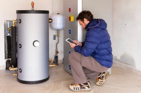 Technician checking water heater in Seattle