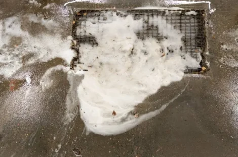 A clogged garage floor drain in Seattle, Washington