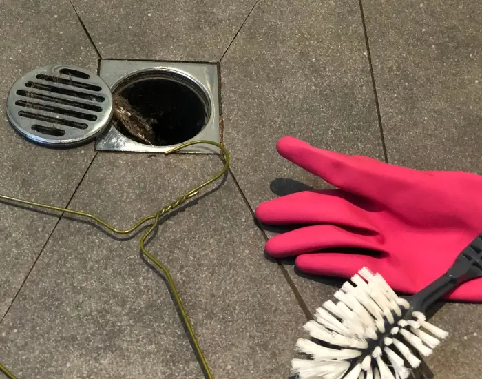 Various tools used for an at-home emergency drain cleaning in Seattle, Washington